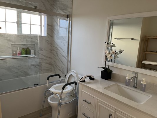 Bathroom with roll-in shower features noted in facility caption at The Rose Garden Elderly Care, San Jose